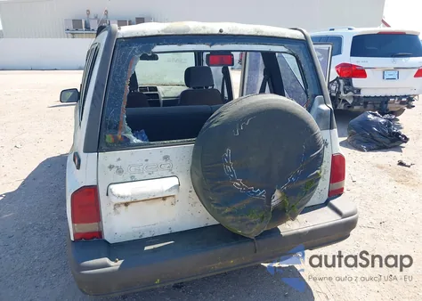 1996 Geo Tracker from USA, damaged, VIN 2CNBE1369T6943219